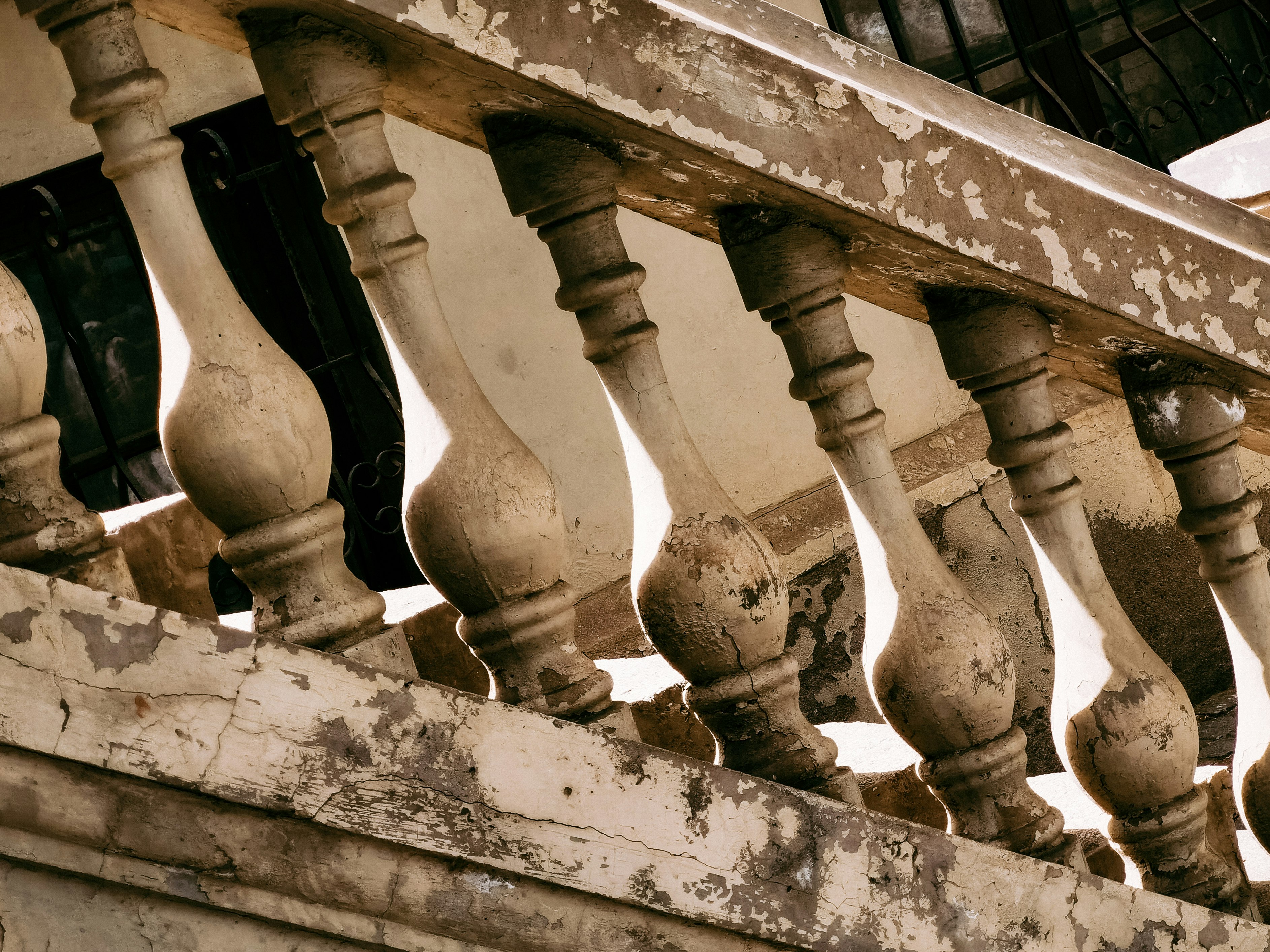 white wooden fence near brown concrete staircase